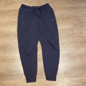 Purple Nike Tech Fleece sweatpants